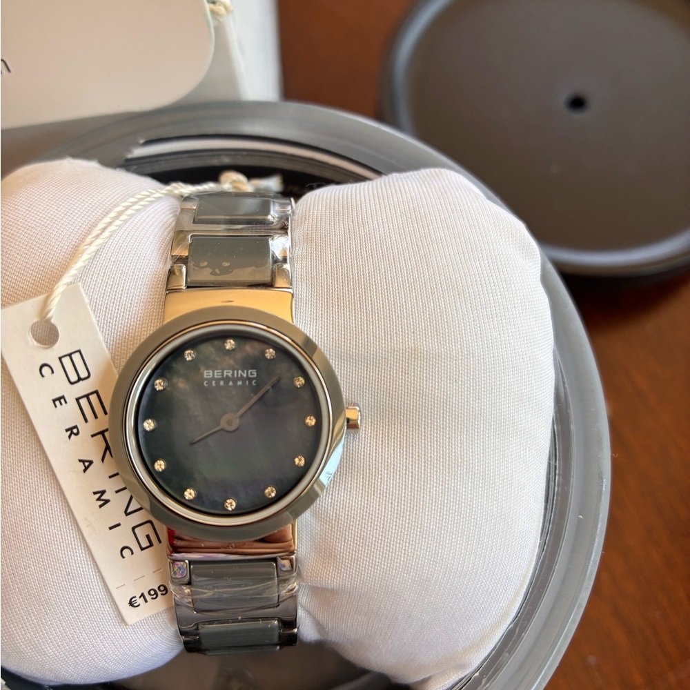 New Bering Silver Ceramic Watch with Mother of Pearl Face and Diamond Accents